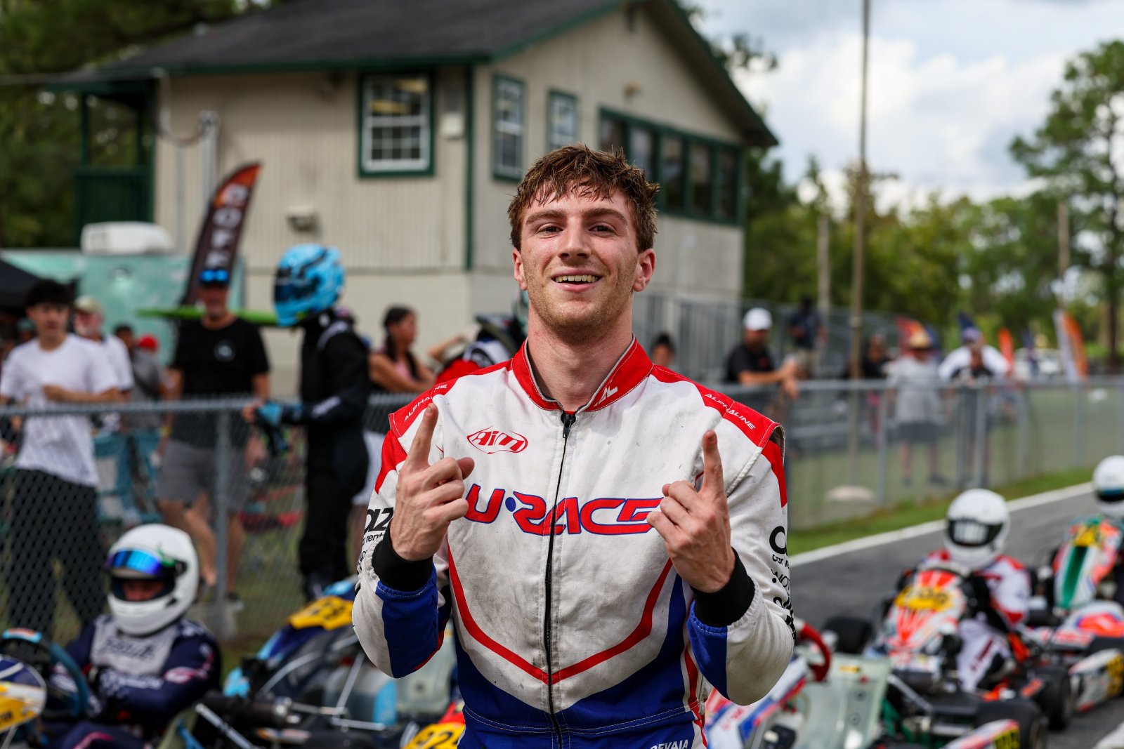Frankie Iadevaia celebrating in his URACE suit, Jacksonville